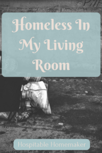 person's feet showing a woman laying on the ground with text overlay homeless in my living room