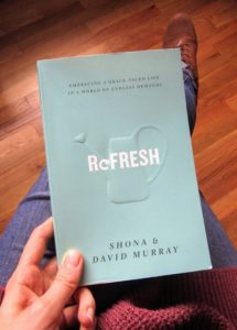woman holding Refresh book in lap - avoiding burn out 