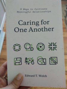 cover of the book caring for one another